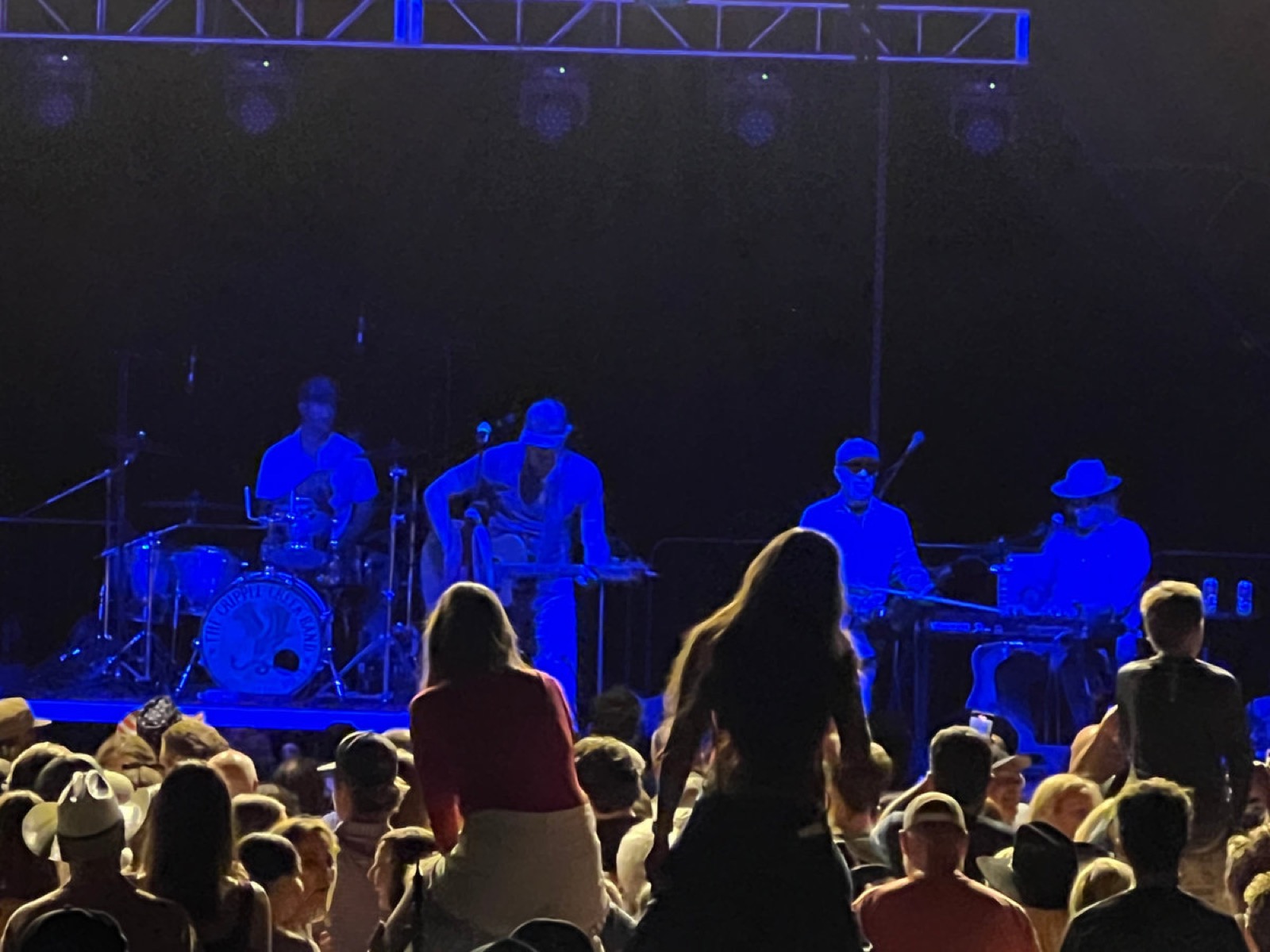 A crowd watching a live band perform at the ETC concert series near Lake Clementia